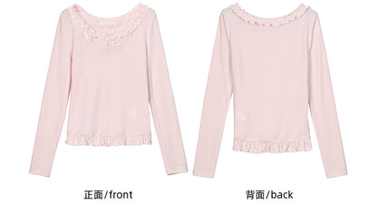 Rosafarbenes, langärmliges Oberteil mit Rüschenbesatz und Schleifendetails