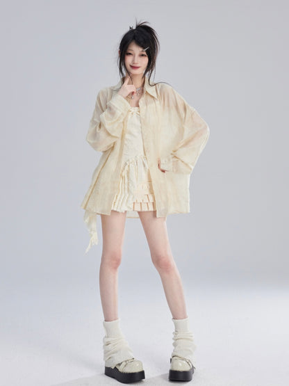 Aprikosenfarbenes, halbtransparentes Sonnenschutz-Shirt/lockere Shorts