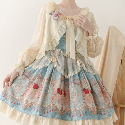 Aprikosenfarbenes Oberteil mit Volantbesatz, Knopfleiste und selbstbindendem Ausschnitt und langen Ärmeln