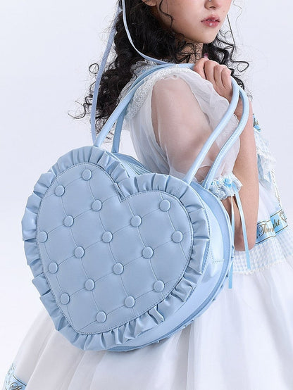 Handtasche in Herzform und Steppraute mit blauen Lolita-Kanten und Rüschen