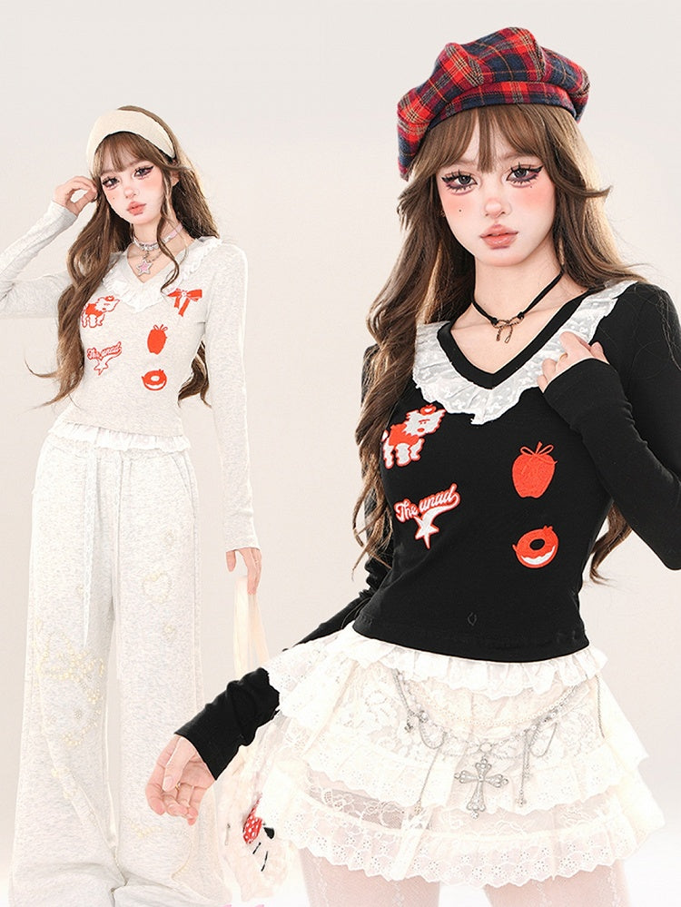 Schwarz/Graues Cartoon-Top mit V-Ausschnitt und Spitzenbesatz