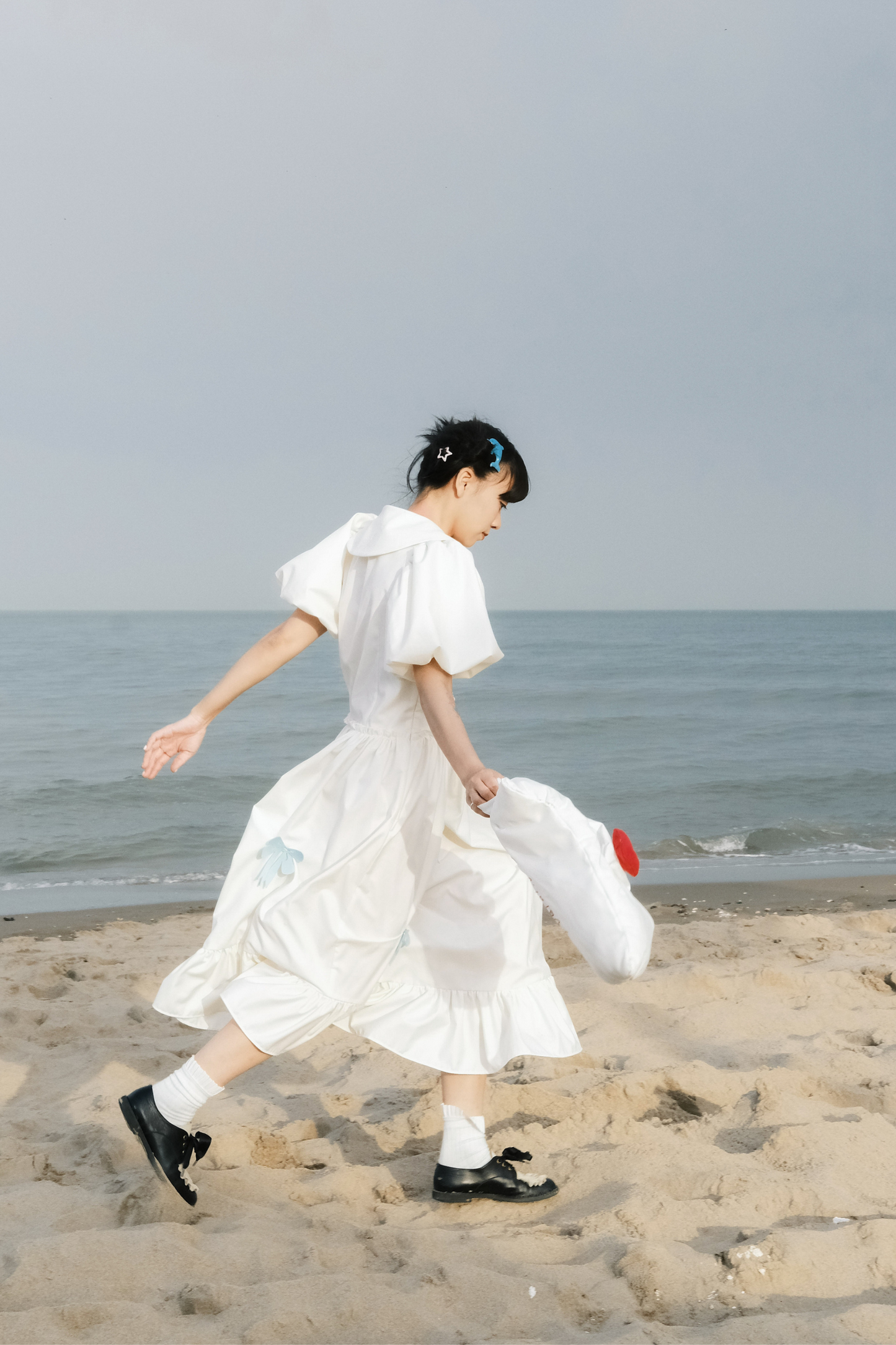 Prinzessinnenkleid mit Ballonärmeln und Schleife