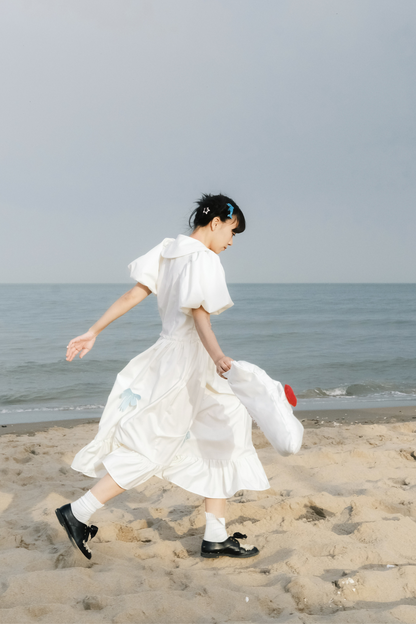 Prinzessinnenkleid mit Ballonärmeln und Schleife