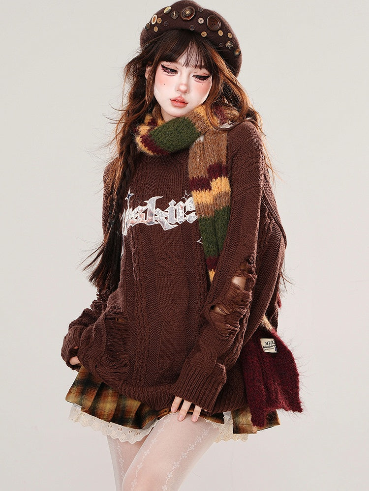 ブラウン/ブラック文字のダメージ加工ホールズルーズセーター