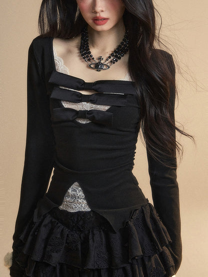 Spitzenaufnäher, glamouröse Details, kontrastierende weiße Schleifen, V-Ausschnitt, schwarzes Strickoberteil