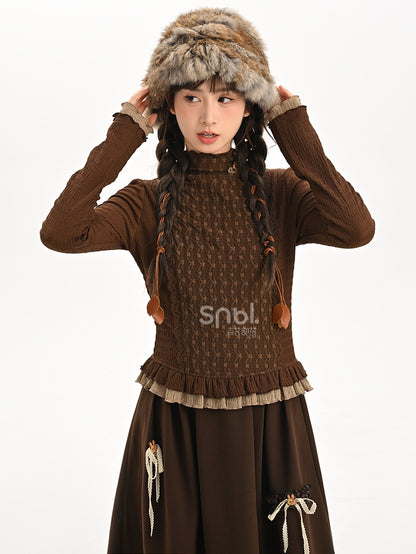 Braunes Oberteil mit Rüschenausschnitt und langen Ärmeln und Rüschensaum