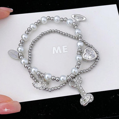 ホワイト/ブラック/レッド サトゥルナンド ボーンチャーム ビーズブレスレット