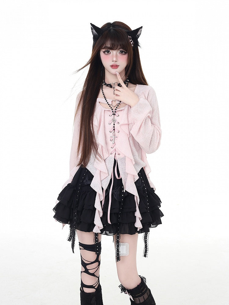 Top en mousseline rose à lacets noirs/clairs, ourlet asymétrique à volants et patte de boutonnage asymétrique