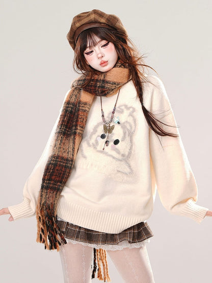 ミルクイエロー/ブラック/レッドのキュートな子犬柄のゆったりセーター