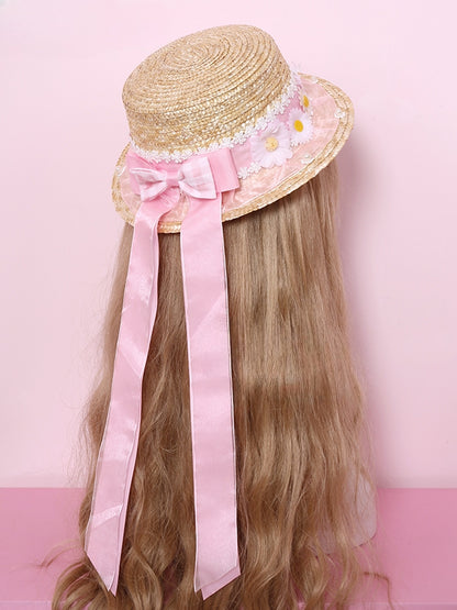 ブルー/ピンク/イエローのデイジーリボンアクセントの麦わら帽子
