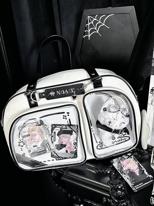 Brotförmige Ita-Umhängetasche in Weiß und Schwarz mit Kontrastbesatz