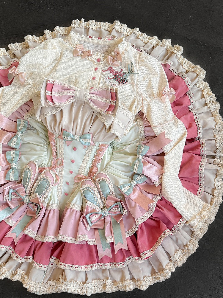 クリーム色の刺繍ディテールの長袖ニットトップス