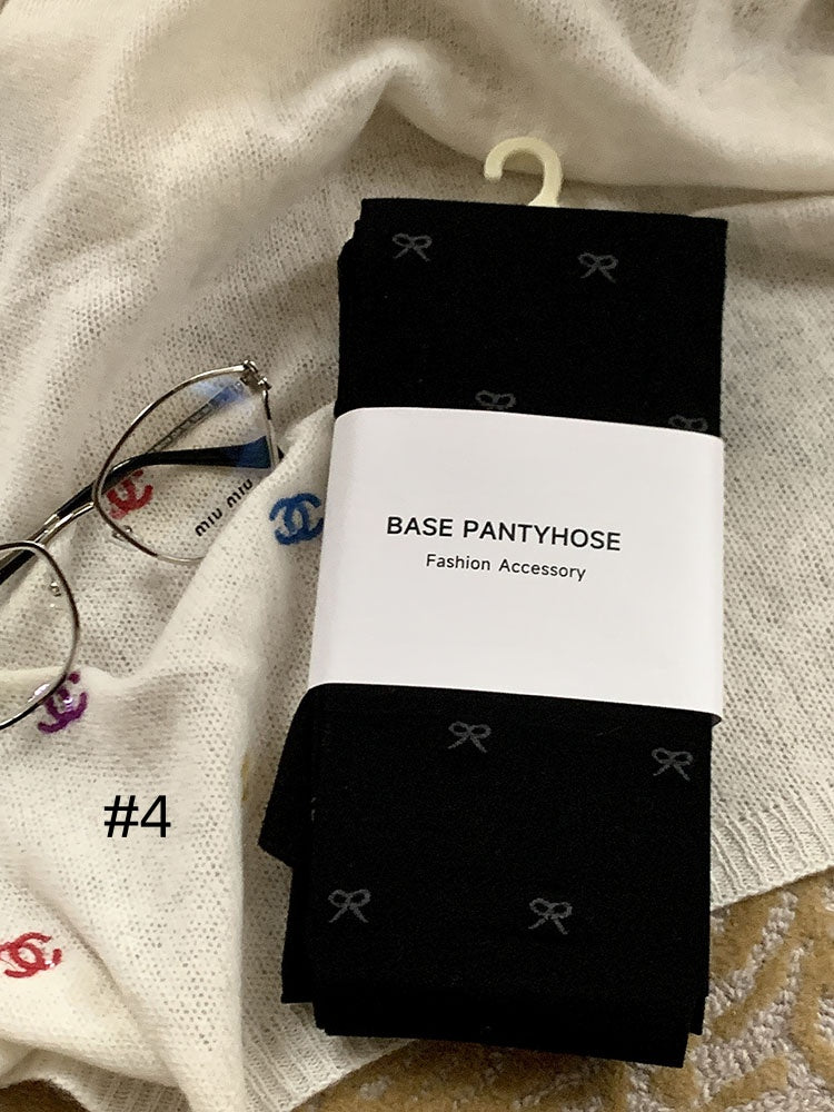 蝶結び柄タイツ