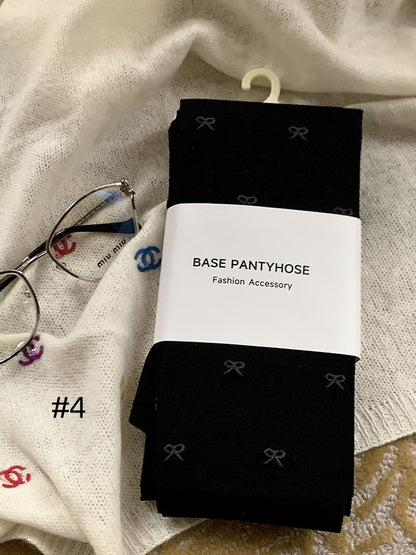 蝶結び柄タイツ