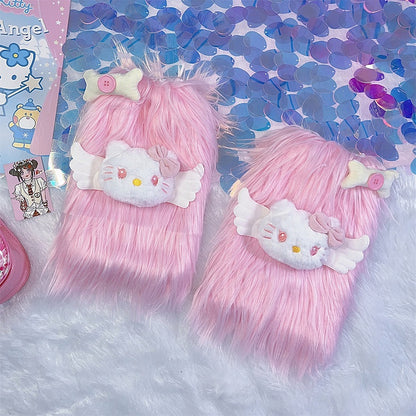 ピンクの子猫と骨のぬいぐるみで飾られた暖かいシャギーレッグウォーマー