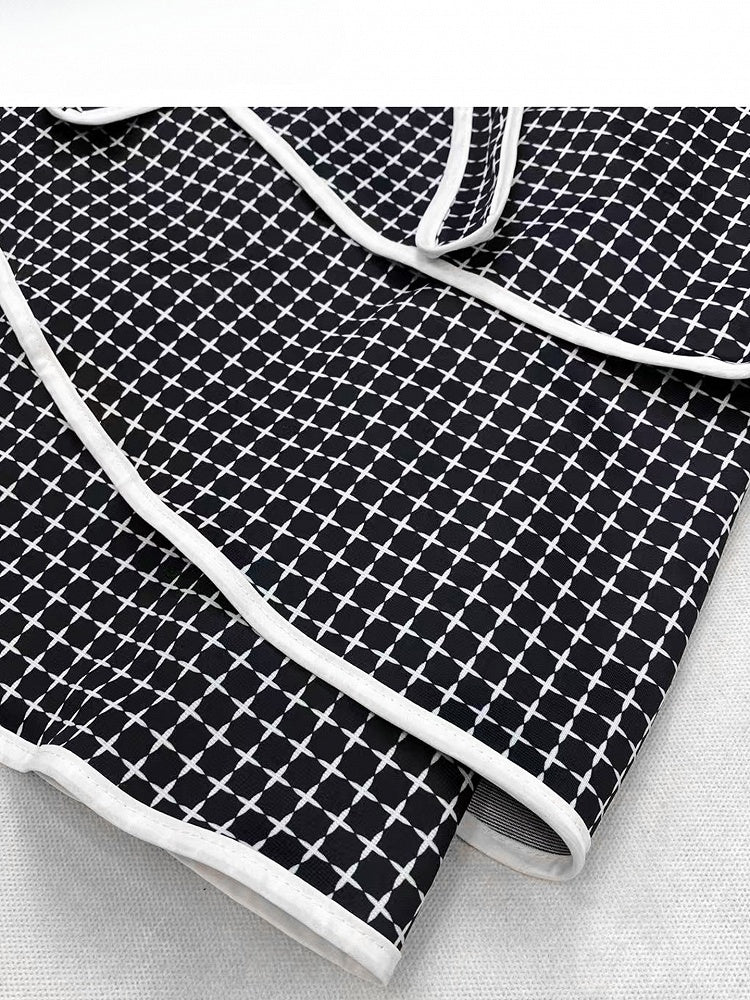 Dekoriertes bittersüßes gestuftes kariertes Schleifenmuster Y2K Schwarz