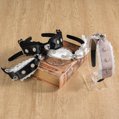 ジライケイ ラインストーンとビーズで飾られたレーストリム 蝶結び KC