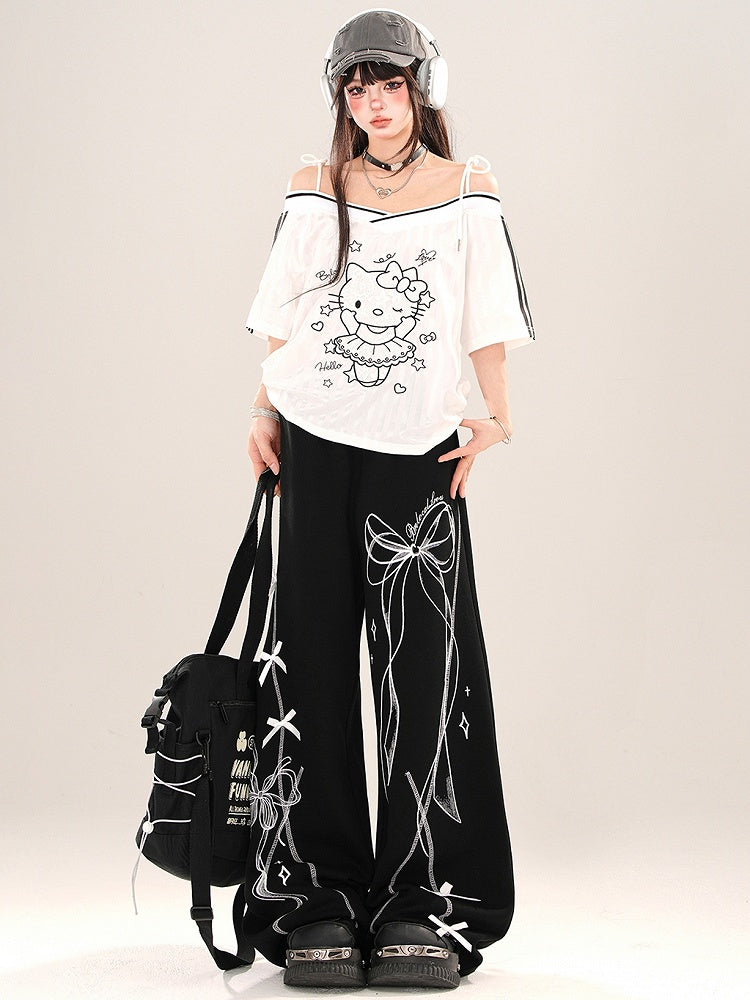 Schwarz/weißes Top mit schulterfreiem Ausschnitt und Kätzchen-Print