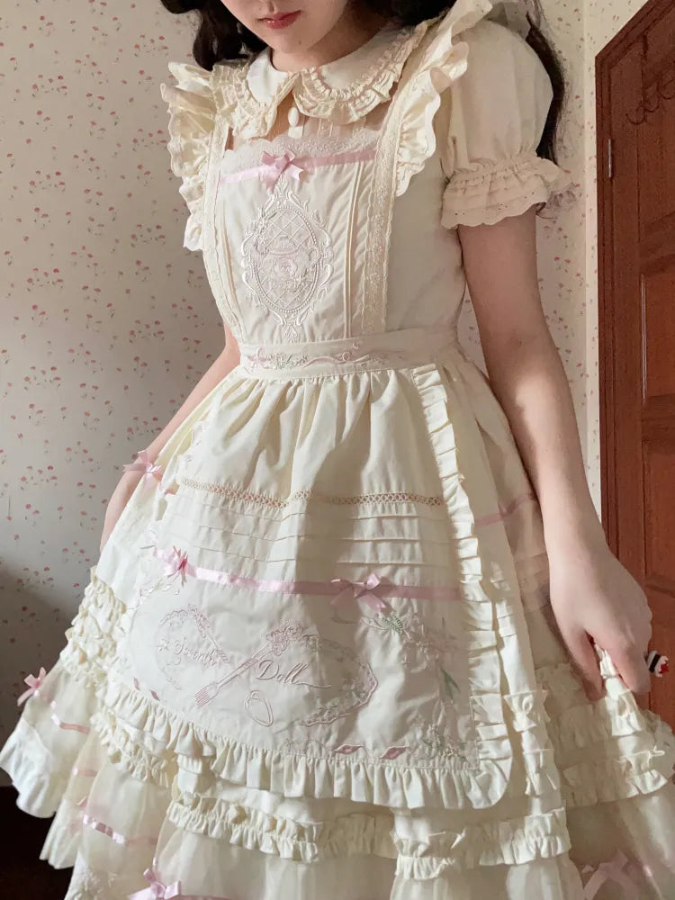 und Schürze Stickerei Floral Teekanne
