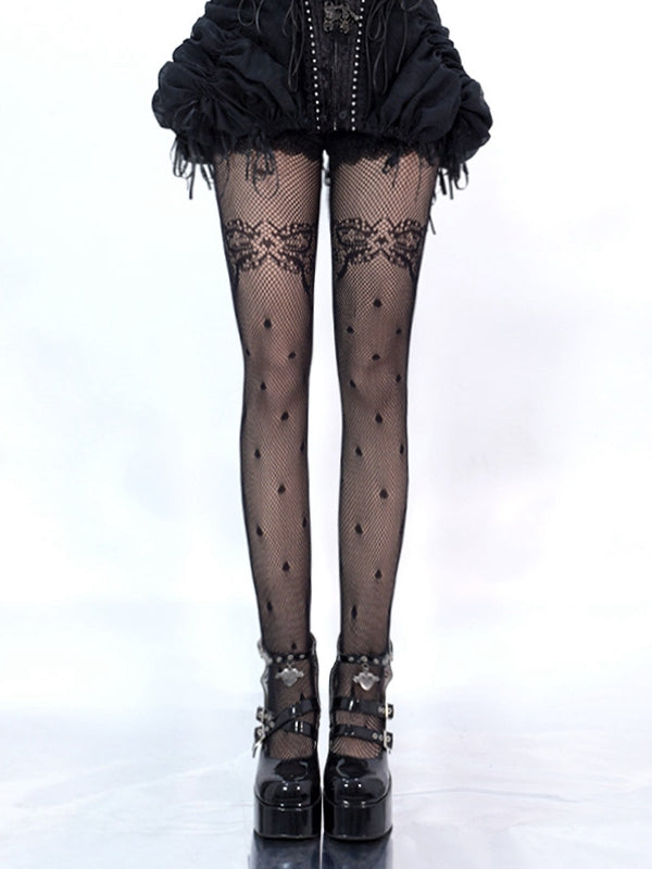 ブラック/ホワイトの蝶結びと水玉模様の網タイツ