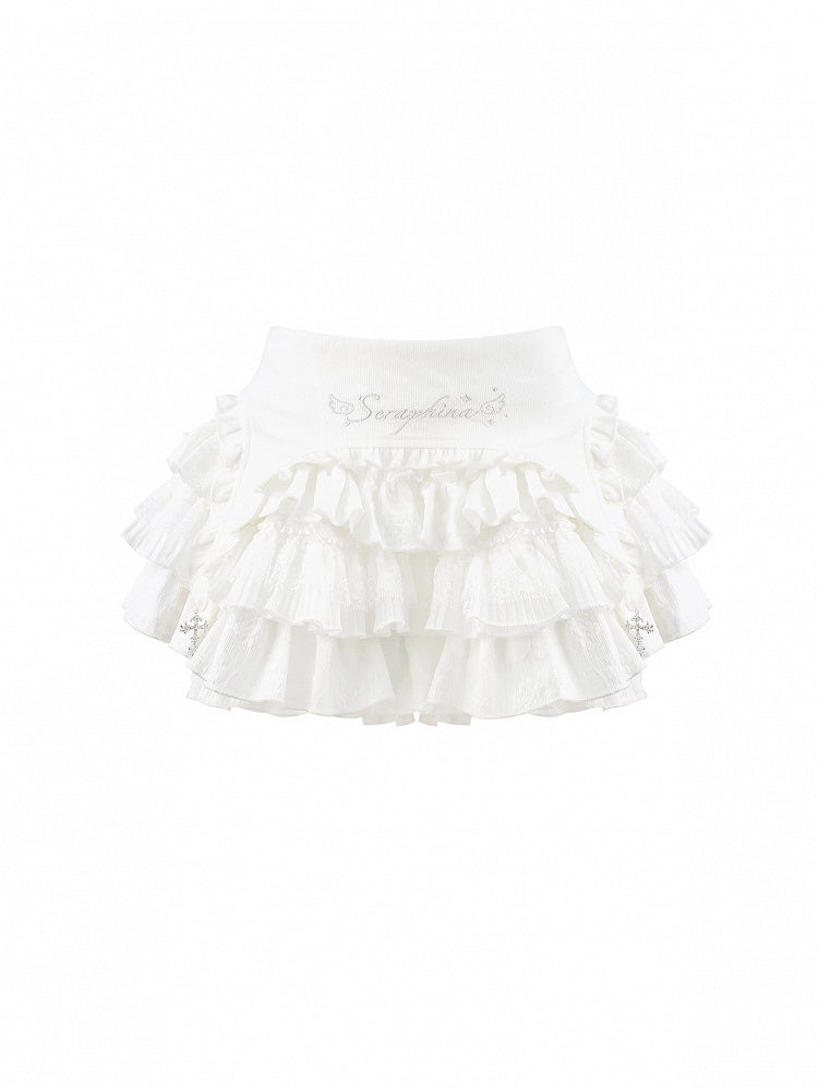 Layered White Ruffle Mini Skirt with Cross Accent & Lining - serendipity