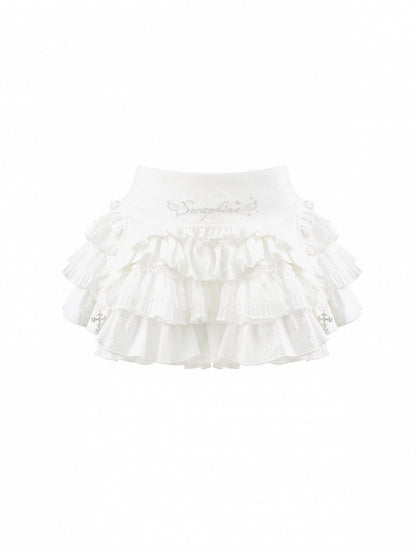 Layered White Ruffle Mini Skirt with Cross Accent & Lining - serendipity