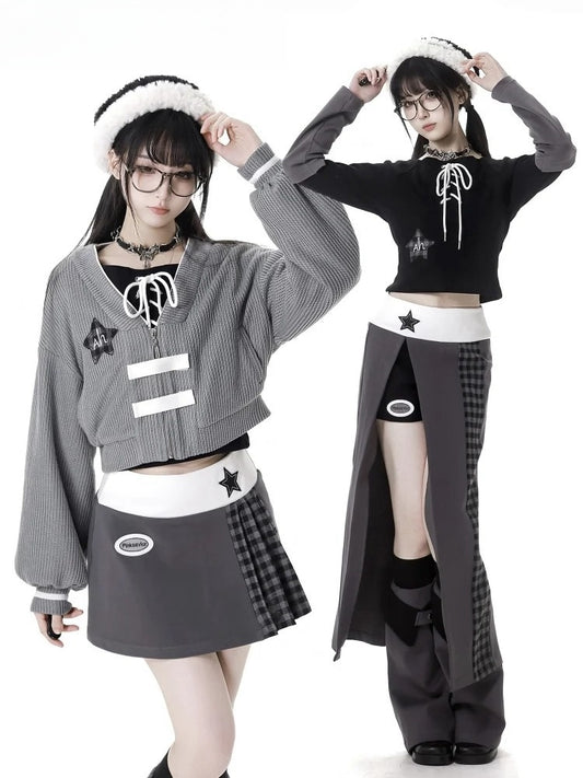 グレーの星飾り付きジップ開閉ニットカーディガン