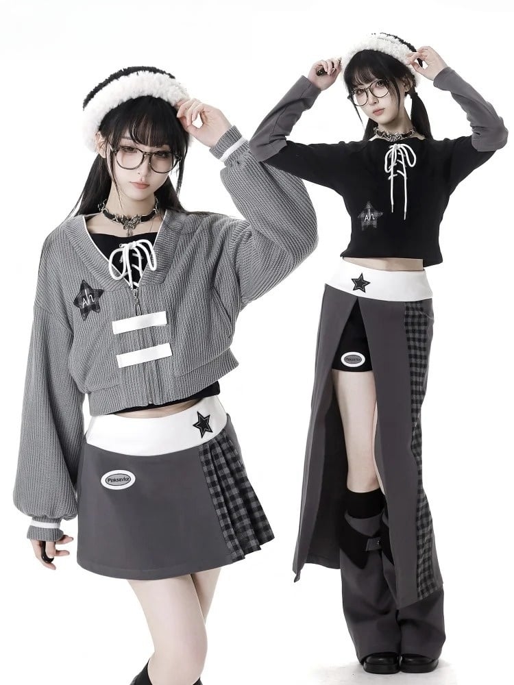 Schwarzes Top mit schulterfreiem Ausschnitt, Stern-Applikation und Schnürdetail