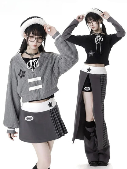 Schwarzes Top mit schulterfreiem Ausschnitt, Stern-Applikation und Schnürdetail