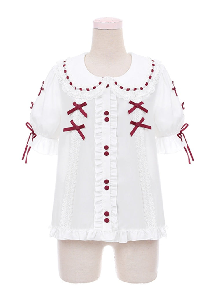 赤い蝶結びと白いピーターパンカラーのレーストリムのスイートロリータブラウス