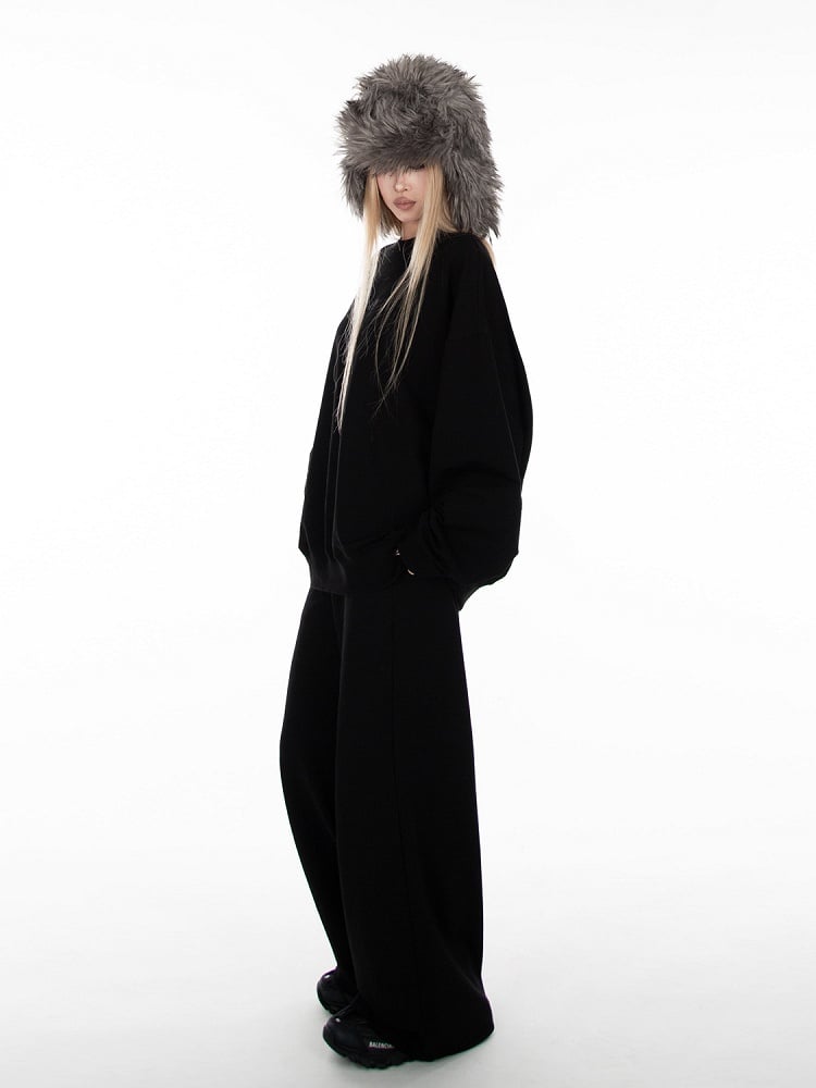 ブラックの長袖ルーズスウェットシャツ