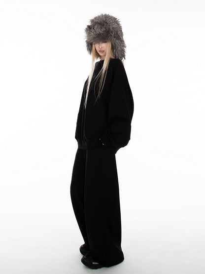 ブラックの長袖ルーズスウェットシャツ