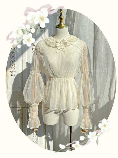 ベージュのセミシースルーレッグオブマトンスリーブブラウス