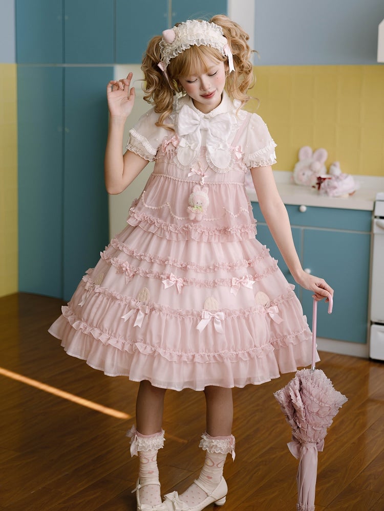 Süßes Lolita-Kleid mit rosa Schleifenakzenten und Rüschenbesatz
