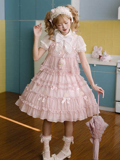 Süßes Lolita-Kleid mit rosa Schleifenakzenten und Rüschenbesatz
