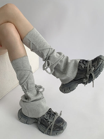 Flared Gray/White Warmers Strappy Leg Design