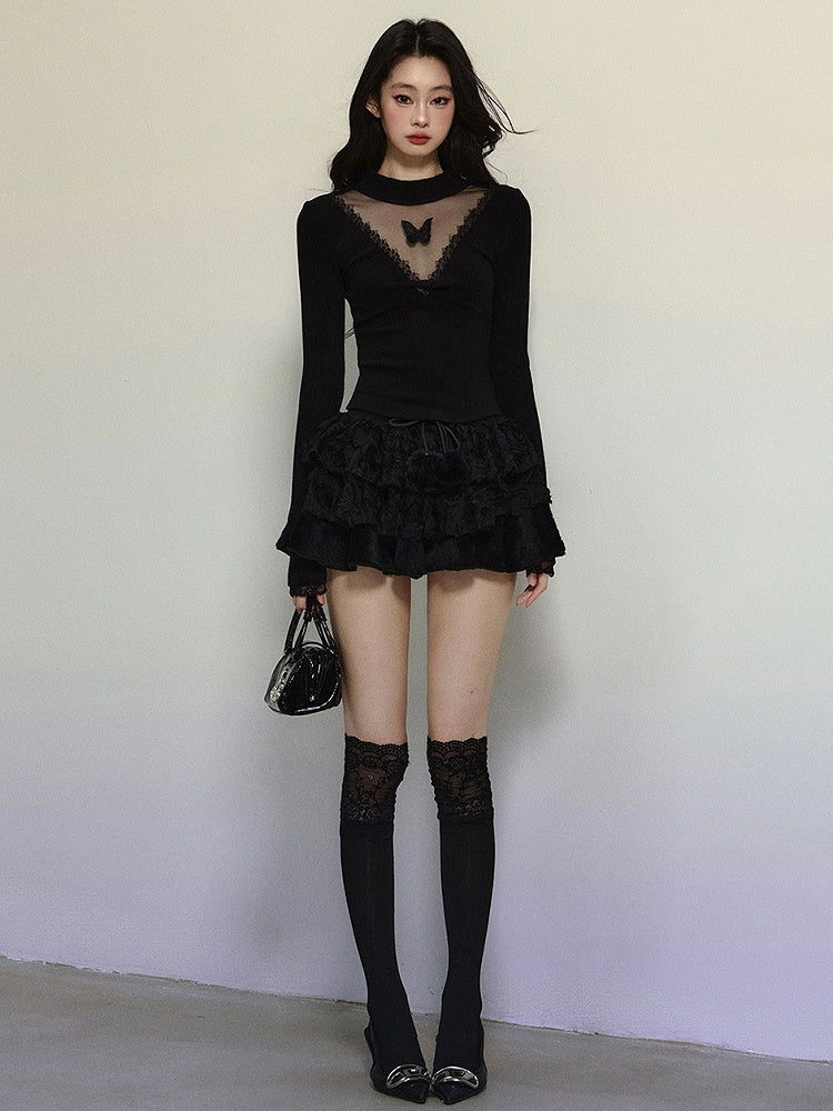 Schwarzes, langärmliges Top mit Illusionsausschnitt und Schmetterlingsakzenten