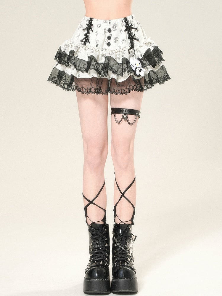 蝶結びのディテール、レースの華やかさ、スカートのクロスプリント、グレーのトリム、ティアードキティ