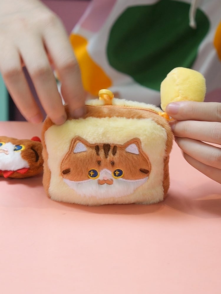 かわいいキティ柄のイエロー＆ブラウンの漫画風コインケース