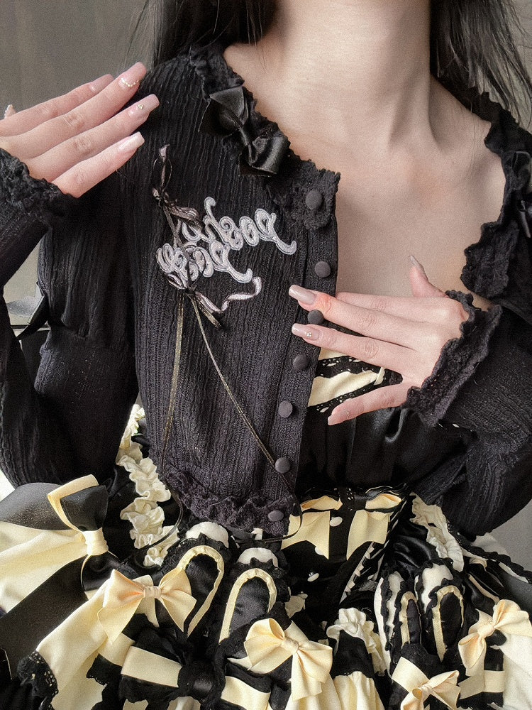 Schwarzes, langärmliges Strickoberteil mit Stickerei