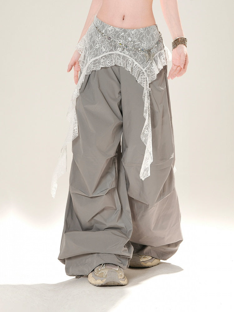 Grau/schwarze Hose mit weitem Bein und niedriger Leibhöhe und Spitzen-Accessoire an der Taille