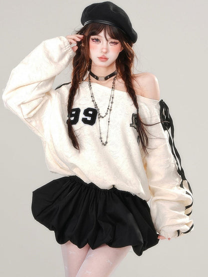 アプリコットアシンメトリーネックラインバブルスカートパッチワークドレス