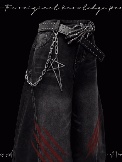 Weite Jeans mit verblasstem Kratzmuster und Used-Look im Punk-Look in verwaschenem Schwarz