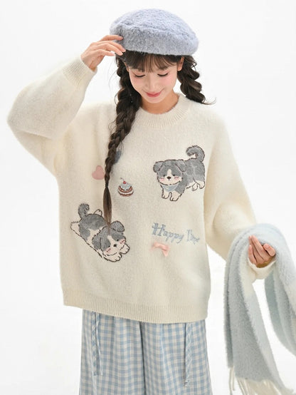 白いかわいい子犬柄のラウンドネックルーズセーター