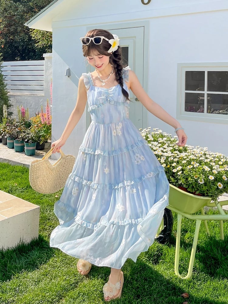 Ärmelloses Kleid mit Blumenstickerei, gestuftem blauem Chiffon und Flatterrock