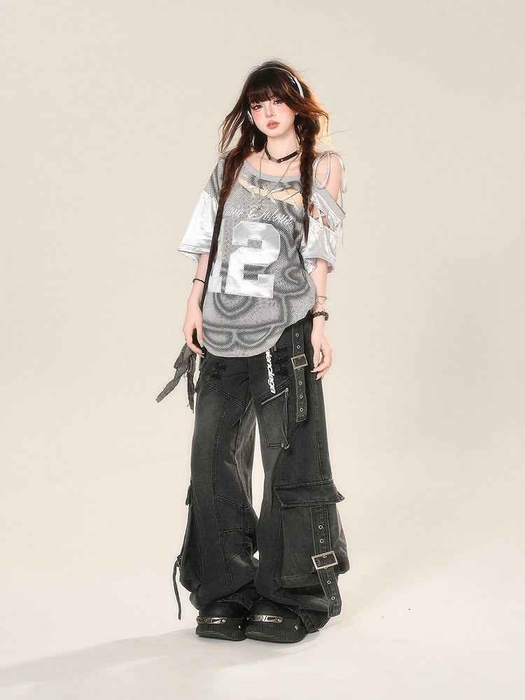 Schwarze Distressed-Jeans mit weitem Bein und Löchern, Schnalle, Cargotaschen und Riemen
