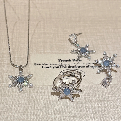 Silberne Ohrringe/Ring/Halskette in Schneeflockenform