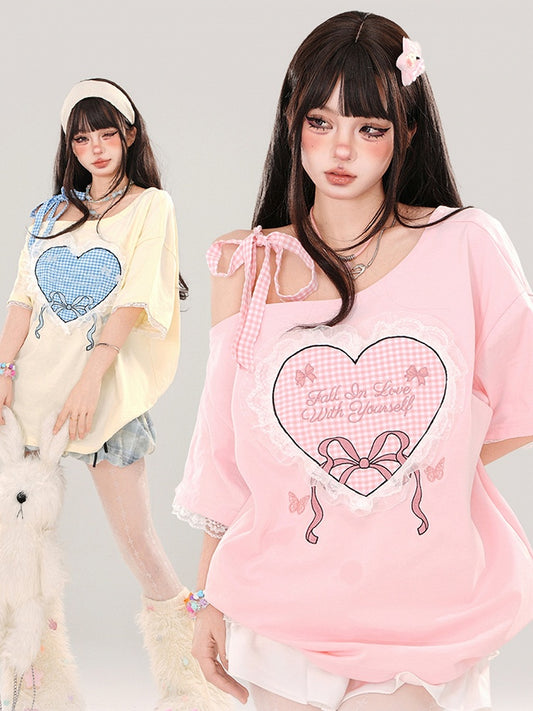 ミルクイエロー/ピンク チェック柄 ハートプリント アシンメトリーネックライン レーストリム Tシャツ