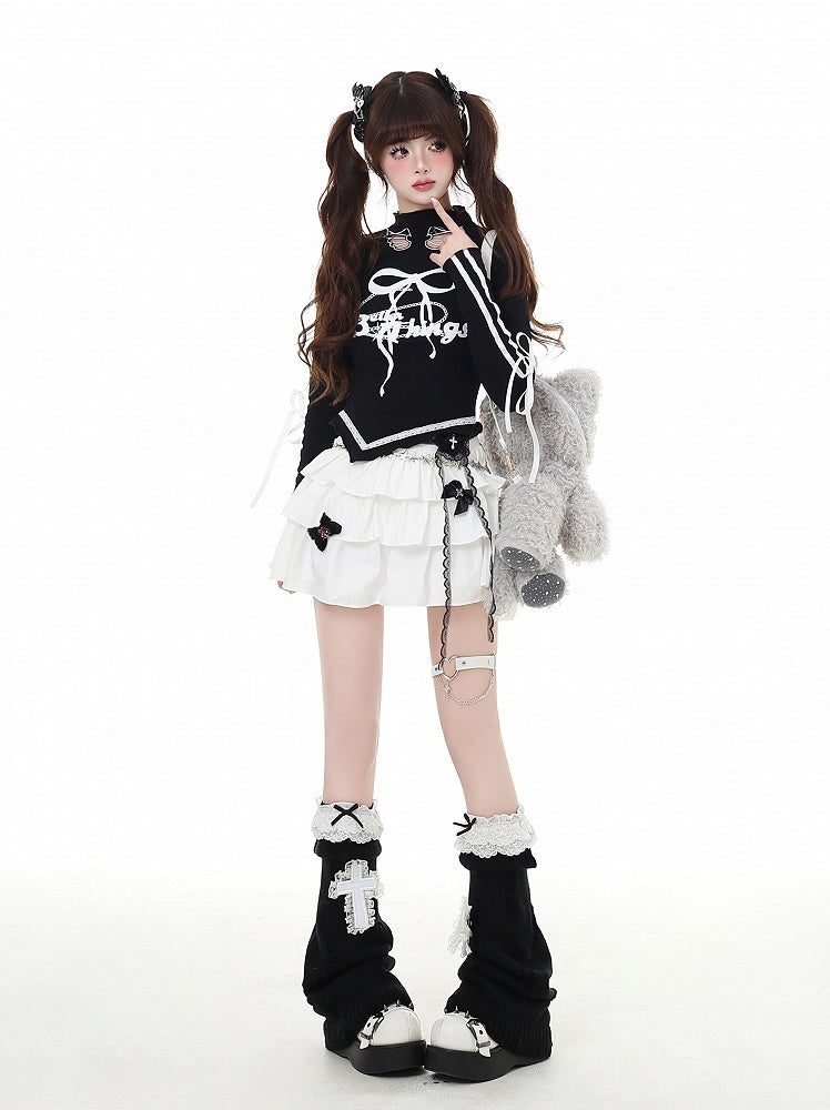 プリントカットアウト、蝶結び、カーブヘム、レッド/ブラック、モックウィングシェイプ、ヴィンテージネック