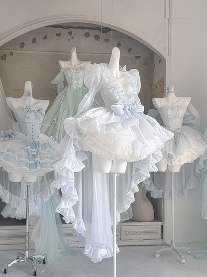 フリル付きロング丈トップス、袖はシアー、裾はカスケーディングヘム、ブルー